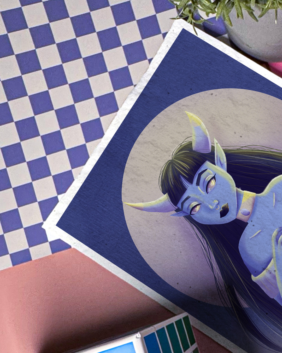 Illustration einer blauen Dämonin auf einem Print